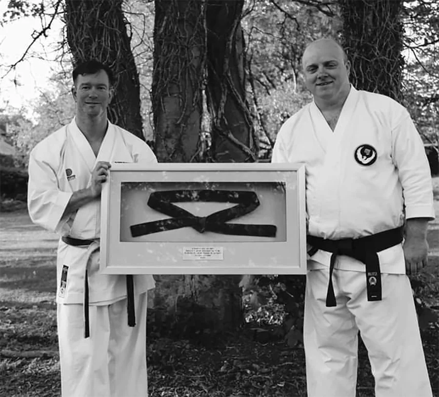 Framed black belt of Sensei Jack Parker displayed by the club